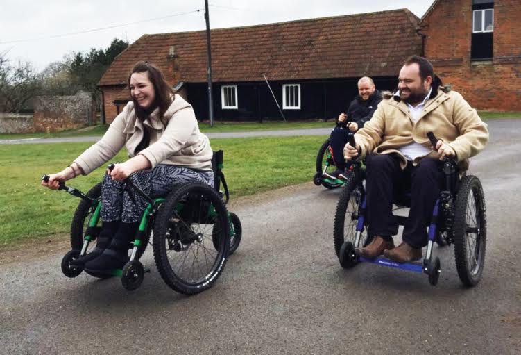 Naomi test rides a mountain trike